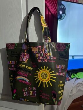 Consuela Black Tote with Bright Yellow Sun & Multicolor Graphics